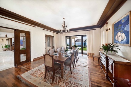The dining area has seating eight with direct access to the pool.