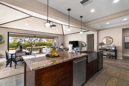 Enjoy seamless kitchen-to-lanai access for effortless indoor-outdoor dining and entertaining.