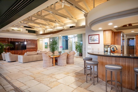 Calming king‑bedroom retreat with private lanai access, where morning coffee meets ocean breeze.