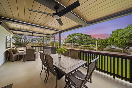 Relax and dine in this covered outdoor area with ceiling fans, perfect for unwinding after a day of adventure.
