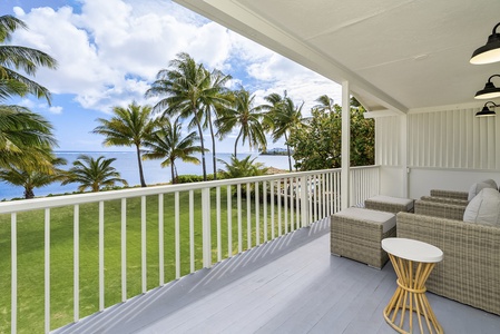 Tropical garden backyard provides a private sanctuary where guests can relax to the sound of gentle waves.
