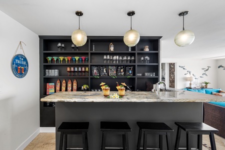 Mix your favorite drinks at a stylish Tiki bar, perfect for easy evenings in.