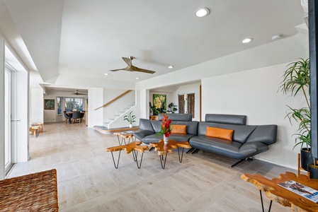 The bright and open living space, perfect for relaxation with easy access to the dining area.