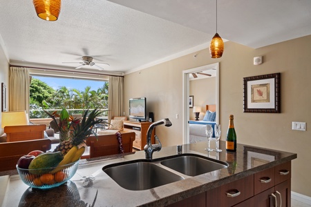 Enjoy easy flow between the kitchen, dining, and living areas in Honua Kai Konea 230’s open-concept layout.