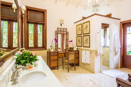 The ensuite bathroom has two vanity spaces and a separate walk-in shower.