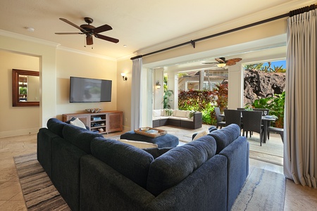 Sunny South Kauai beckons from this gorgeous three-bedroom, three-bath villa at Poipu Kai.