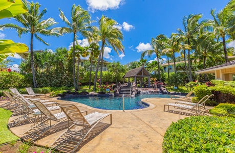 Relax by the resort-style pool, surrounded by tropical landscaping and plenty of loungers.