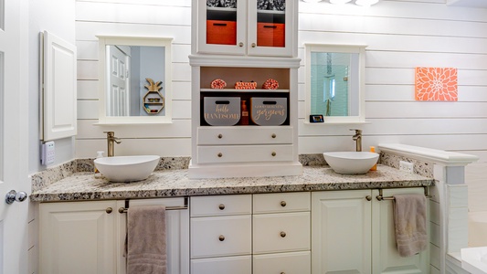 The primary bathroom is a dreamy space with delightful aesthetics.