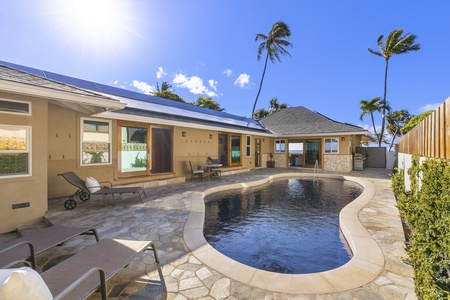 Private pool area surrounded by lounge seating—soak in the sun with Diamond Head as your backdrop.