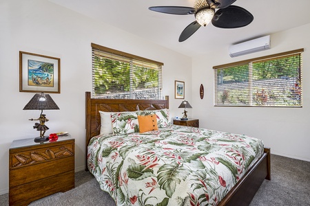 Guest bedroom with king bed, TV and A/C