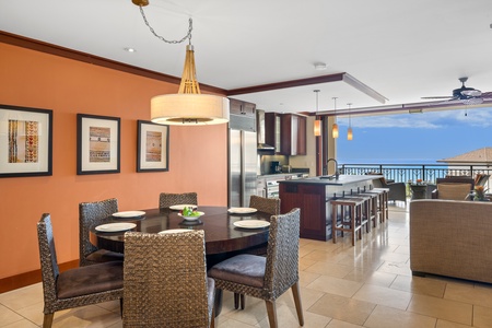 The dining area and kitchen area are part of an open floor plan.