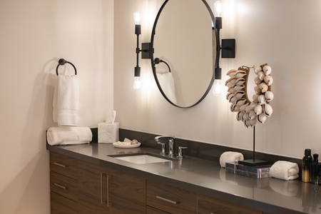 Primary ensuite bathroom with a wide vanity