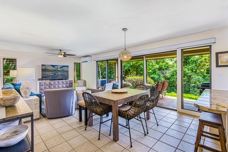 The open dining area provides seating for six with easy access to the lanai.