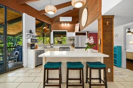 Claim a barstool at the island while dinner comes together on the other side.