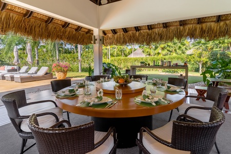 Dine al fresco by the pool.