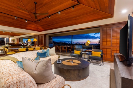 Modern open concept great room w/floor to ceiling pocket doors to upper deck.