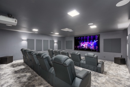 Relax in our 10-seat theater with luxury reclining chairs and seamless Apple TV access