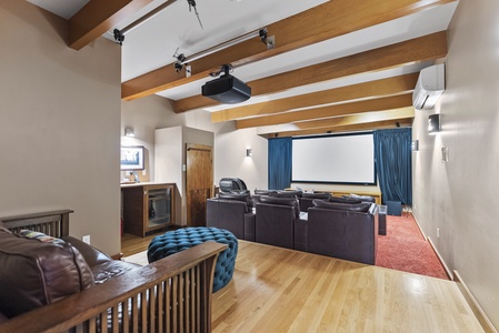 Enjoy unforgettable movie nights in the private theater, featuring comfortable reclining seating, a large projection screen, and an immersive cinematic experience.