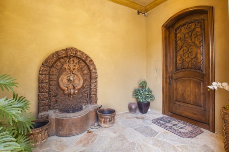 Lovely water feature by the inviting front door