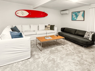 Another view of the seating area, offering a casual lounging space.