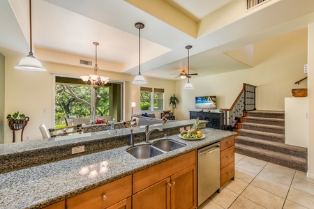 Two-story vaulted ceilings and open-concept living bring together comfort, elegance, and plenty of room to unwind.