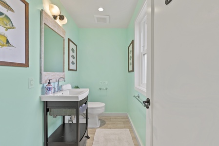 There is a half bath downstairs