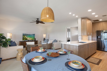 Swim and lounge at the resort-style shared pool, surrounded by palms and sunny deck space.