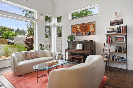 The Black Squirrel’s inviting layout flows with natural light, bold art, and cozy furnishings.
