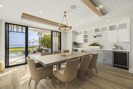 Grand double-staircase foyer that sets a dramatic tone as soon as you step inside.