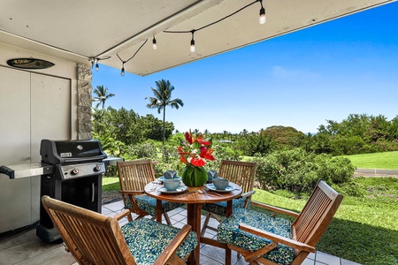 Enjoy outdoor dining with a view in the lanai with table for four.