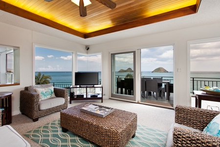 Enjoy a cozy living space with panoramic ocean views.