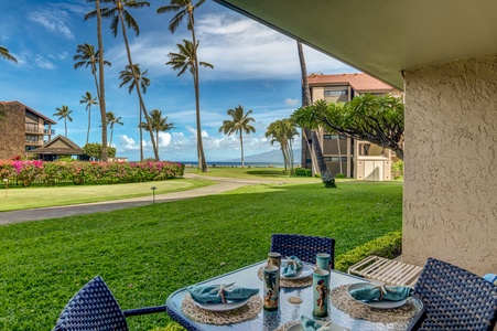 Relax in Papakea B-105’s stylish living area with easy access to lush outdoor surroundings.