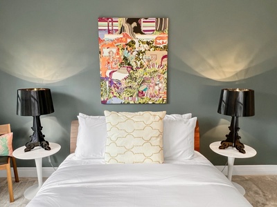 Tranquil bedroom three with a queen bed and direct access to the backyard and pool.