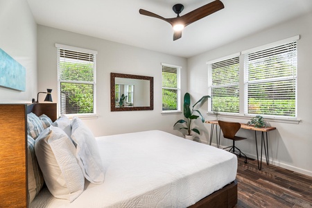 Stay entertained and inspired in our guest suite 1, offering TV luxury and window wonders.