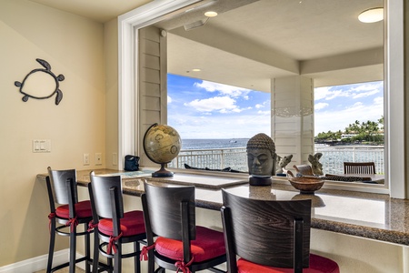 Breathtaking views of the ocean right from the couch—coastal comfort meets elegant design.