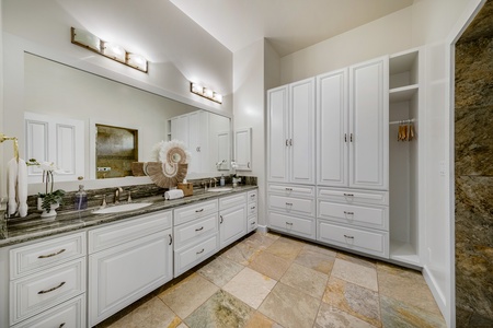 Dual sinks and additional storage makes getting ready for the day a breeze.