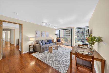 Enjoy easy indoor-outdoor living with plush seating and a private lanai beyond.
