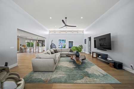 Cook and connect in the gourmet kitchen with a large island, gas range, and space for everyone to gather.
