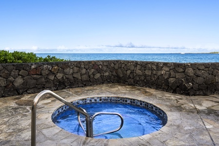 Ocean-view hot tub offers soothing relaxation steps from your door.