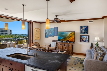 Beautifully furnished living room that overlooks the kitchen.