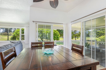 Natural light pours into this cozy dining nook with garden views.