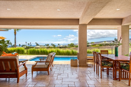 Perfect for alfresco meals and sunset cocktails, featuring a built-in BBQ, wet bar, and serene views.