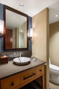 The third guest bath is a full bathroom with a single vanity.