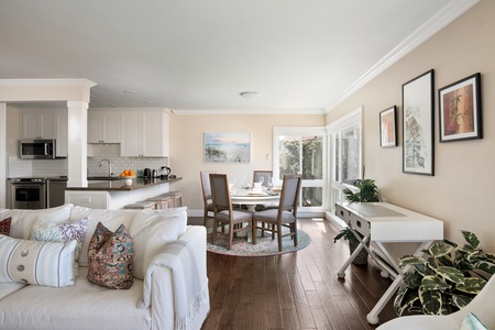 Open-concept living space with elegant furnishings, perfect for relaxation and entertaining.