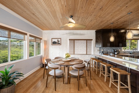 From coffee to cocktails, the bar-height counter and round dining setup allow for casual meals or laid-back productivity with a view.