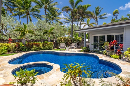 Have meals outside in the fresh air on this covered lanai by the pool.