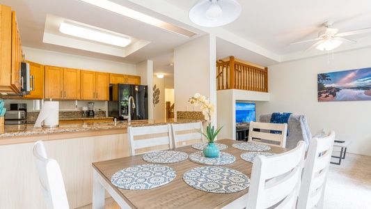 The kitchen is open and bright for entertaining.