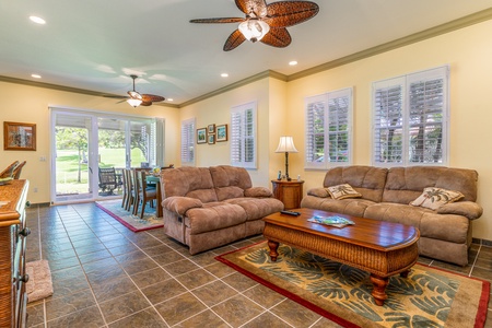Kick back in the cozy living area, perfect for reading, napping, or watching your favorite shows after a day in the sun.