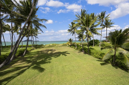 Enjoy some time in the shaded outdoor seating area with gorgeous tropical views
