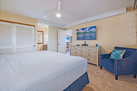 The guest bedroom at Royal Kahana 610 offers a cozy retreat with a comfortable bed and relaxing decor.